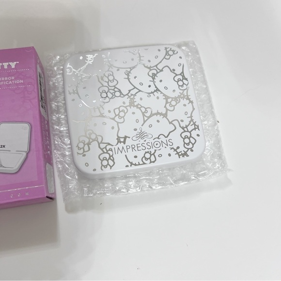 NEW Impressions x Hello Kitty® Supercute Compact Mirror with Magnification - Picture 7 of 7